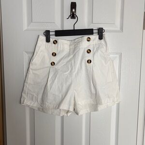 HALARA High Waist White Shorts with Gold Buttons